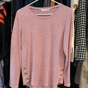 Women’s striped top with button detail.